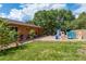 Spacious backyard with lush grass and a play area for children, perfect for outdoor activities at 452 Gordon Dr, Castle Rock, CO 80104