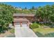 Beautiful two-story home boasts a well-kept lawn, mature trees, and a convenient two-car garage at 452 Gordon Dr, Castle Rock, CO 80104