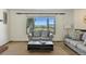 Comfortable living room features large windows with scenic views and cozy seating at 452 Gordon Dr, Castle Rock, CO 80104