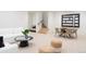 Spacious basement features a cozy seating area, dining table, and stairs to the upper level at 716 S Race St, Denver, CO 80209