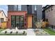 A modern home with unique architectural details and inviting front porch at 716 S Race St, Denver, CO 80209
