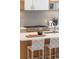 A gourmet kitchen featuring stainless steel appliances and a large center island with seating at 716 S Race St, Denver, CO 80209