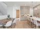 Well-lit kitchen with a modern design and open dining space at 716 S Race St, Denver, CO 80209
