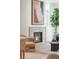 Living room featuring a fireplace, modern decor, and large windows at 716 S Race St, Denver, CO 80209
