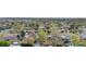 Aerial view of neighborhood with foliage, homes, and rooftops at 258 S 14Th Ave, Brighton, CO 80601