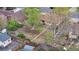 Aerial view of brown house, green yard, and wooden fence at 258 S 14Th Ave, Brighton, CO 80601