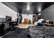 Finished basement room with bed, desk and recreational furniture at 258 S 14Th Ave, Brighton, CO 80601