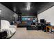 Spacious basement area set up for recreation with carpet and painted walls at 258 S 14Th Ave, Brighton, CO 80601