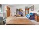 Inviting living room featuring cozy carpet, a TV, and a ceiling fan at 258 S 14Th Ave, Brighton, CO 80601