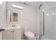 Bathroom with glass-enclosed shower, contemporary fixtures, and tiled floors at 4037 S Odessa Cir, Aurora, CO 80013