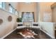 Cozy second floor sitting area featuring hardwood floors and natural light at 4037 S Odessa Cir, Aurora, CO 80013
