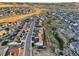 Aerial view of neighborhood with neat streets, homes, and open spaces at 5029 Silver Hare Ct, Castle Rock, CO 80104