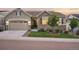 Charming home featuring a stone facade, well-maintained lawn, and inviting curb appeal at 5029 Silver Hare Ct, Castle Rock, CO 80104