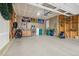 Spacious garage with epoxy floor, storage, and garage door opener at 5029 Silver Hare Ct, Castle Rock, CO 80104