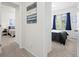 View of two bedrooms separated by a hallway at 4451 S Ammons St # 4-203, Littleton, CO 80123
