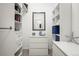 Walk in closet with a mirror, shelving, drawers and carpeted floors at 4451 S Ammons St # 4-203, Littleton, CO 80123