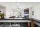 Living room view featuring fireplace, furniture and slider to exterior balcony at 4451 S Ammons St # 4-203, Littleton, CO 80123