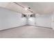 Basement featuring a ceiling fan and windows with curtains that add natural light at 10841 Montview Blvd, Aurora, CO 80010