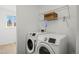 Convenient laundry area equipped with modern washer and dryer units at 2638 S Lewiston St, Aurora, CO 80013