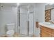 Cozy bathroom featuring a glass-enclosed shower and modern fixtures at 350 Albion St, Denver, CO 80220