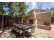 Outdoor dining area with an outdoor fireplace perfect for gatherings and evening relaxation at 350 Albion St, Denver, CO 80220