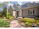 Charming front exterior with landscaped yard and inviting walkway at 350 Albion St, Denver, CO 80220