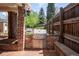 Outdoor kitchen featuring a stainless steel grill, brick surround, and a quaint patio perfect for entertaining at 350 Albion St, Denver, CO 80220