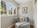 Bright sitting area features large windows and a comfortable chair, perfect for relaxation at 350 Albion St, Denver, CO 80220