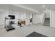 Finished basement featuring exercise equipment at 7882 S Valentia Way, Centennial, CO 80112