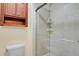 Bathroom featuring a tiled glass shower and cabinet at 7882 S Valentia Way, Centennial, CO 80112