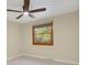 Bedroom featuring a wooden window at 7882 S Valentia Way, Centennial, CO 80112