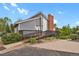 Community clubhouse featuring a brick chimney and accessible ramp at 7882 S Valentia Way, Centennial, CO 80112