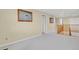Upstairs hallway with natural wood trim at 7882 S Valentia Way, Centennial, CO 80112