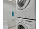 Laundry room featuring stacked washer and dryer at 7882 S Valentia Way, Centennial, CO 80112