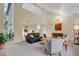 Bright, open living space with vaulted ceilings and comfortable seating, perfect for entertaining at 7882 S Valentia Way, Centennial, CO 80112