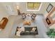 Spacious living room with fireplace and ample natural light from large windows at 7882 S Valentia Way, Centennial, CO 80112