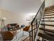 Spacious open-concept living area offers modern dining and comfortable seating, perfect for relaxing and entertaining at 1103 S Monaco Pkwy, Denver, CO 80224