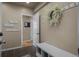 Inviting entryway with tile flooring, a bench, and decorative accents at 19735 Knights Xing, Monument, CO 80132