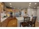 Large kitchen with plenty of storage, stainless appliances and seating at the counter at 19735 Knights Xing, Monument, CO 80132