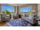 Bright living room with large windows and scenic views at 19735 Knights Xing, Monument, CO 80132