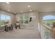 Comfortable loft area with rocking chairs and views of the surrounding landscape at 19735 Knights Xing, Monument, CO 80132
