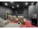 Comfortable movie room featuring theater seating, large television and popcorn machine at 19735 Knights Xing, Monument, CO 80132