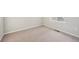A bedroom with neutral carpeting and base trim at 7312 Watercress Dr, Littleton, CO 80125
