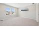 Spacious bedroom with carpeted floors, large windows, and recessed lighting at 7312 Watercress Dr, Littleton, CO 80125