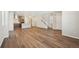 Open floor plan seamlessly connects the living room, kitchen and staircase at 7312 Watercress Dr, Littleton, CO 80125