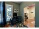 Comfortable living room featuring a work area and stylish furnishings at 2941 Glenarm Pl, Denver, CO 80205
