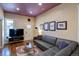 Cozy living room with stylish decor, a comfortable sofa, and hardwood flooring at 2941 Glenarm Pl, Denver, CO 80205