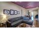 Spacious living room with hardwood floors, comfortable seating, and a seamless open floor plan at 2941 Glenarm Pl, Denver, CO 80205
