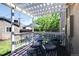 Outdoor porch with a covered pergola, table, and chairs perfect for relaxation at 2941 Glenarm Pl, Denver, CO 80205