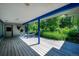 An outdoor patio with greenery in the background at 990 S Jackson St, Denver, CO 80209